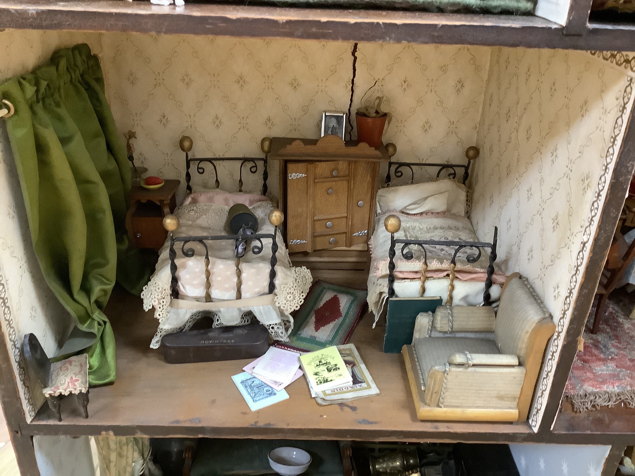 A furnished English dolls’ house, circa 1810-20, 104cm high